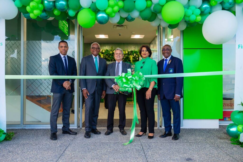 First Citizens Group deputy CEO business generation Jason Julien (left); First Citizens chairman Anthony I Smart; Finance Minister Colm Imbert; Group CEO Karen Darbasie; and Mayor Sigler Jack cut the ribbon at the new First Citizens West Vale branch on June 28.
(Photo courtesy First Citizens) - 