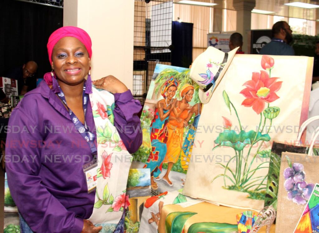 Nkese Miller of Nkese Designs displays her products during the Trade and Investment Convention (TIC) at the Centre of Excellence, Macoya on July 20. - Ayanna Kinsale