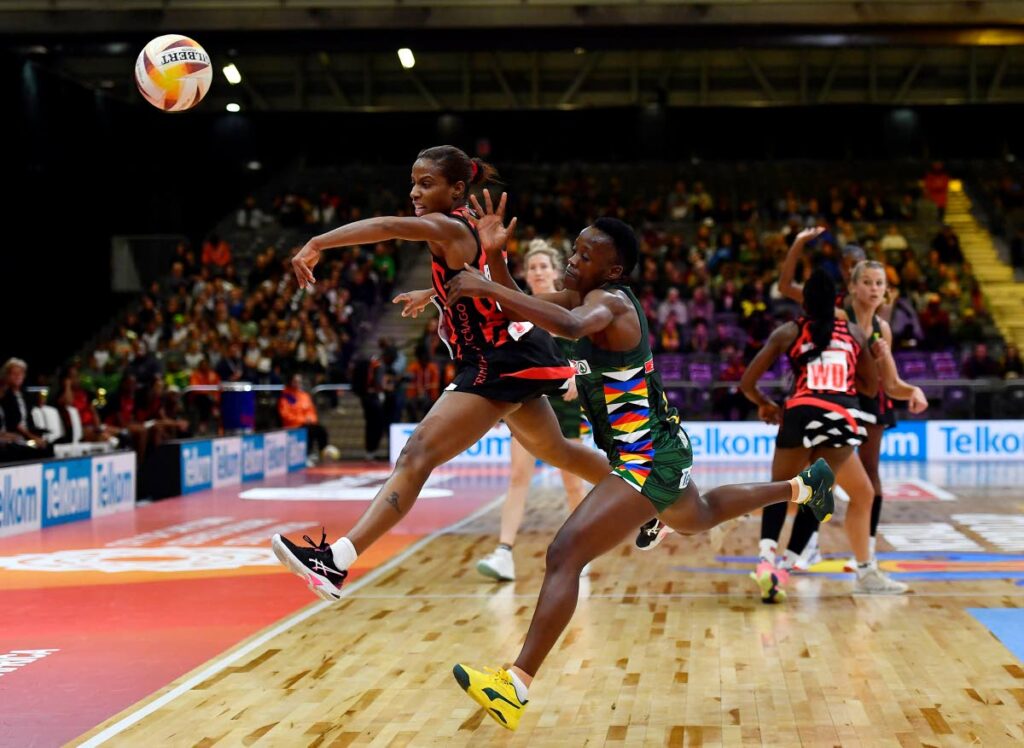 Trinidad and Tobago's Alena Brooks (L) jumps to defend against South Africa captain Bongiwe Msomi during the Netball World Cup 2023, Pool G match at Cape Town International Convention Centre Court 1 on Monday, in Cape Town, South Africa. - Ashley Vlotman