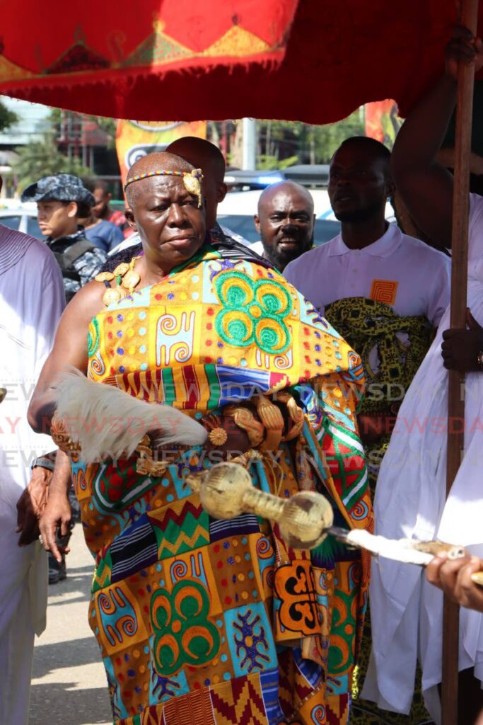 His Majesty Otumfuo Osei TuTu 11, Asantehene of Ghana,  walks along  the Drag at the Queen's Park Savannah, Port of Spain on Emancipation Day. - Photo by Angelo Marcelle