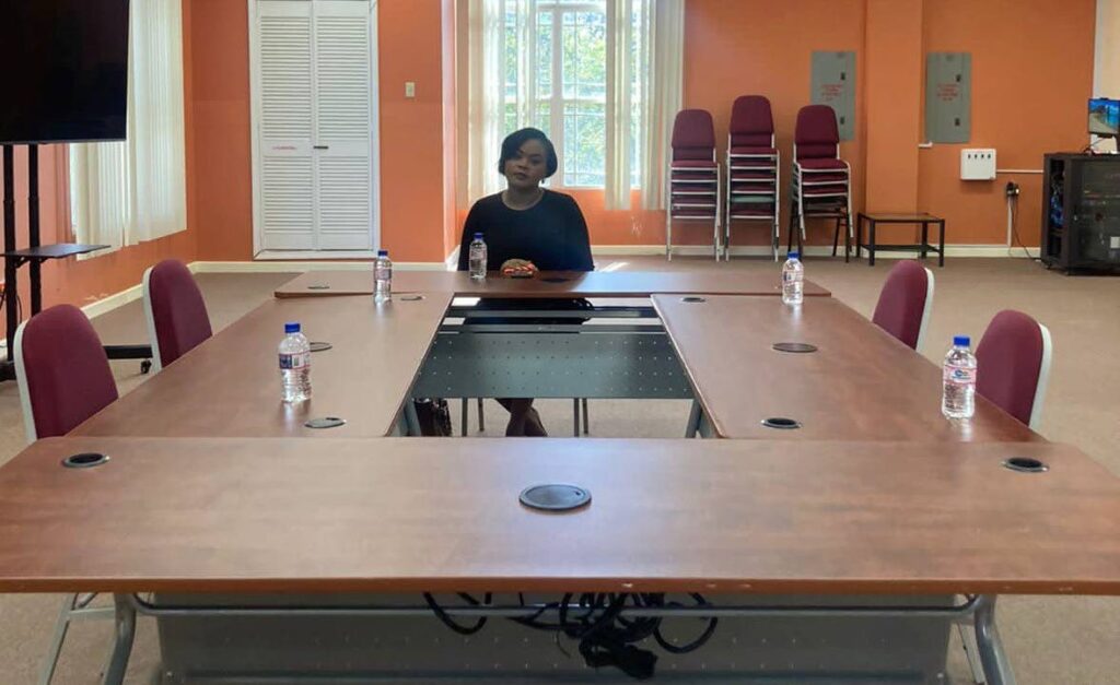 Sport Minister Shamfa Cudjoe sits in a room waiting on THA officials for a meeting, who she claims never showed up.  - 