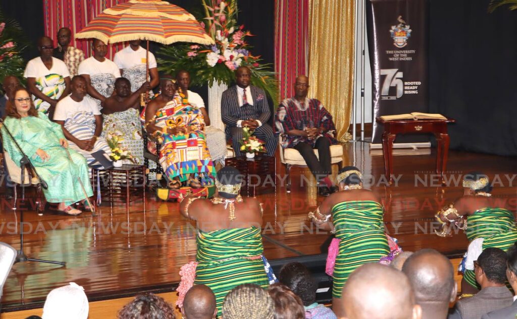 UWI principal Prof Rose-Marie Belle Antoine, from left, His Majesty Otumfuo Osei TuTu 11, Asantehene of Ghana, and Prime Minister Dr Keith Rowley enjoy entertainment by the king’s dancers at Daaga Auditorium, at the St Augustine campus on Thursday. The king gave a lecture at the event.   - Angelo Marcelle