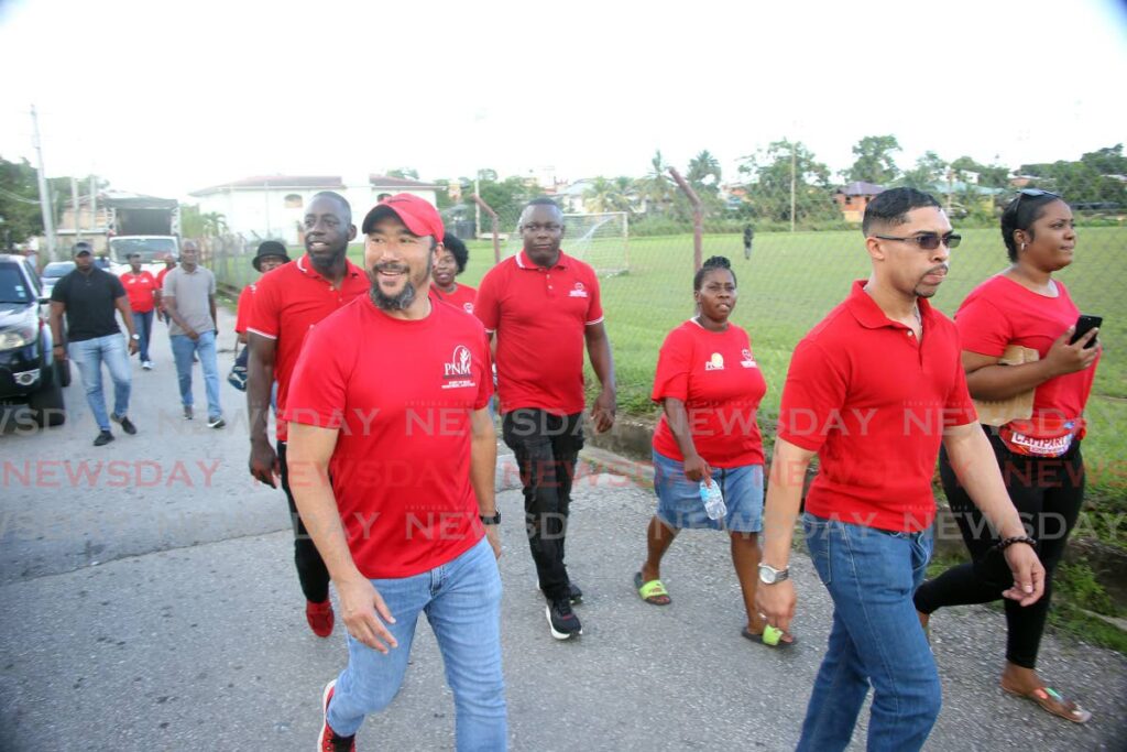 Energy Minister and PNM chairman Stuart Young during a walkabout at Savannah, Road, Point Fortin for the local government campaign o Friday.  - Photo by Lincoln Holder
