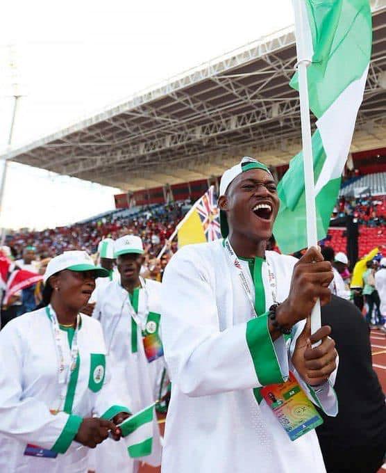 Samuel Ogazi with the Nigerian contingent at the opening ceremony for the Commonwealth Youth Games.  - 