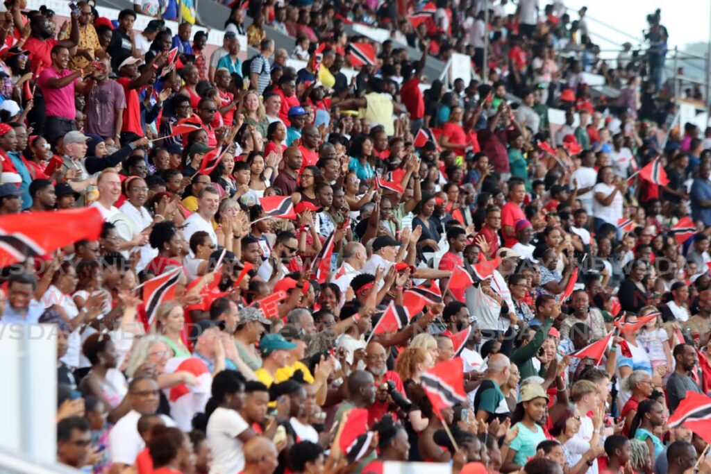 Local fans cheer athletes on the final day of the Commonwealth Youth Games, Hasely Crawford Stadium, Port of Spain on August 10. - ANGELO MARCELLE