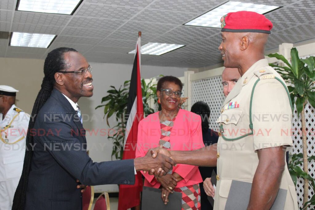 National Security Minister Fitzgerald Hinds greets new members of the TT Cadet Force Advisory Committee - Grevic Alvarado