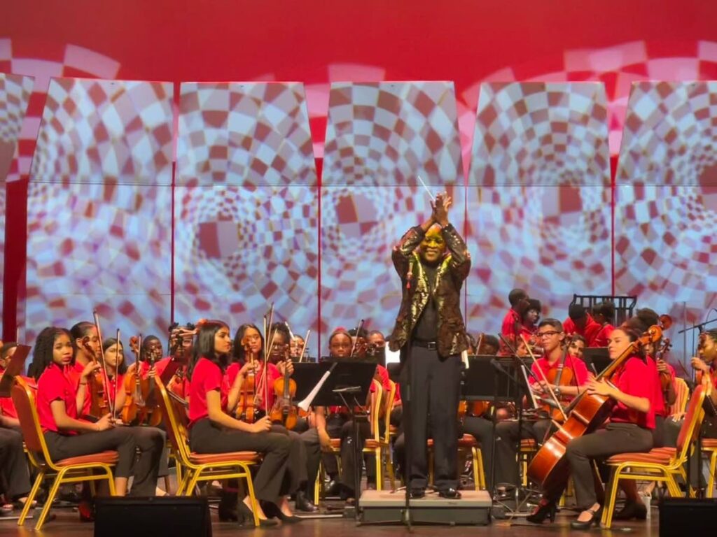 Kenneth Listrhop with the TT Youth Philarmonic Orchestra at the Fanfare and Tribute to Stalin concert on August 6 at the National Academy for the Perfroming Arts (NAPA), Port of Spain. - 