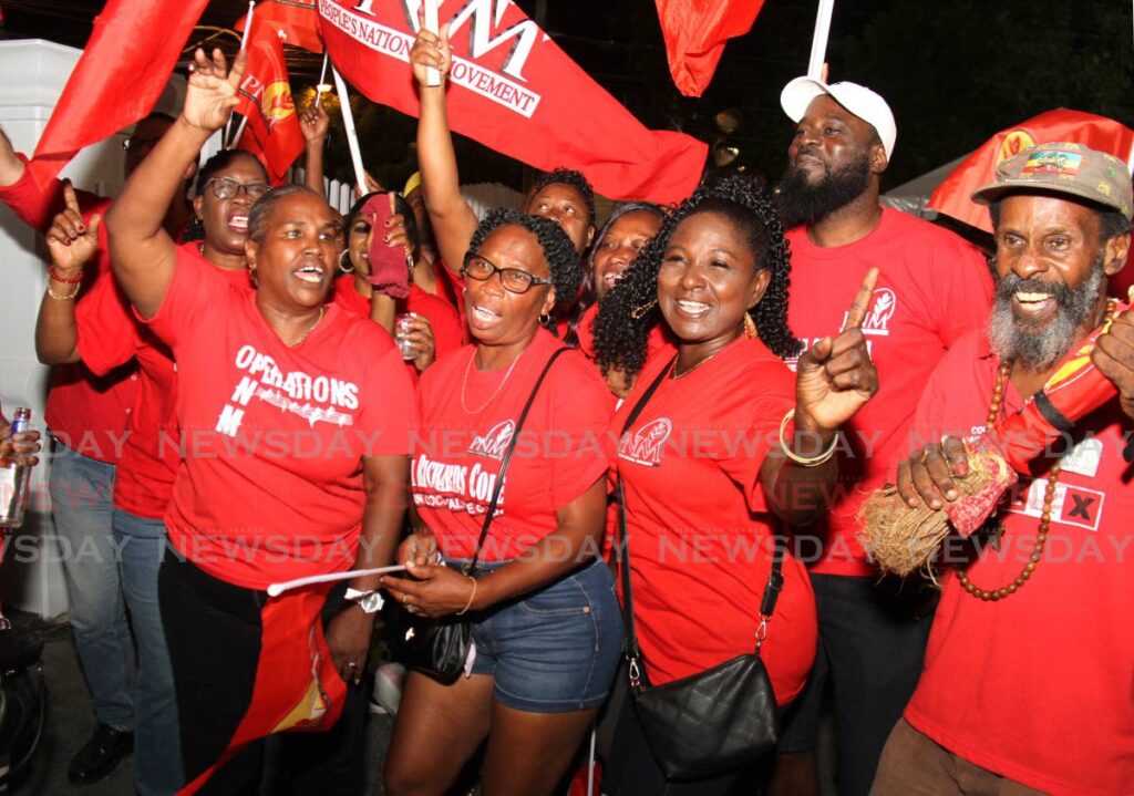PNM supporters celebrate after the announcement of local government election results at Balisier House, Port of Spain, on Monday night. The party retained control of its seven regional corporations in the election. - Ayanna Kinsale