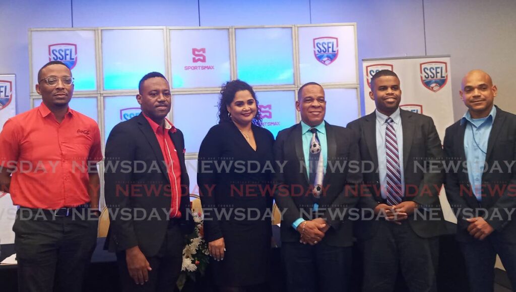 Coca Cola senior brand specialist Anthony Lovelace, from left, SportsMax CEO Nicholas Matthews,  National Gas Company head, communications and brand Nicola Ghouralal, SSFL president Merere Gonzales, Shell regulatory and P&A advisor Leston Davis and Ministry of Sport and Community Development physical education sport officer I Ronson Hackshaw. - Jelani Beckles
