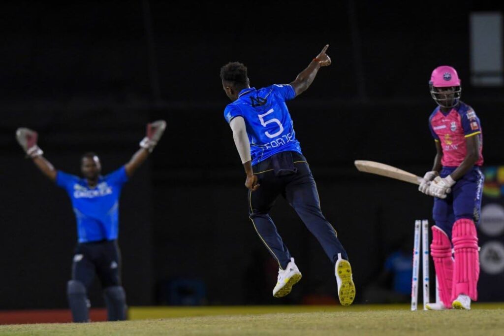 St Lucia Kings fast bowler Matthew Forde peels away in celebration after bowling out Barbados Royals' Kevin Wickham on Thursday night in St Lucia. Photo courtesy CPLT20/Getty Images - 