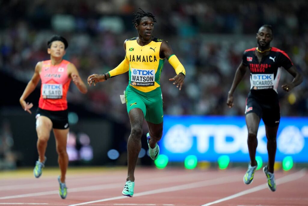 Jamaican Antonio Watson, centre, wins a men's 400m semifinal during the World Athletics Championships in Budapest, Hungary, Tuesday. TT's Jereem Richards, right, placed fouth.  - AP
