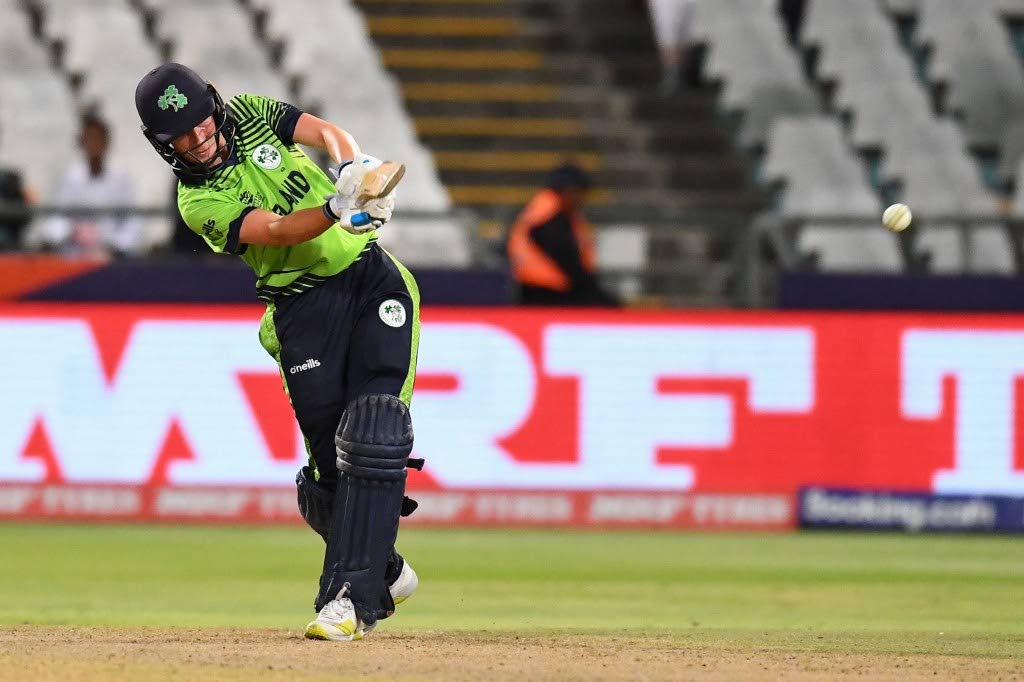 In this file photo, Ireland's Orla Prendergast watches the ball after playing a shot during the Group B T20 women's World Cup match against West Indies at Newlands Stadium in Cape Town on February 17. - 