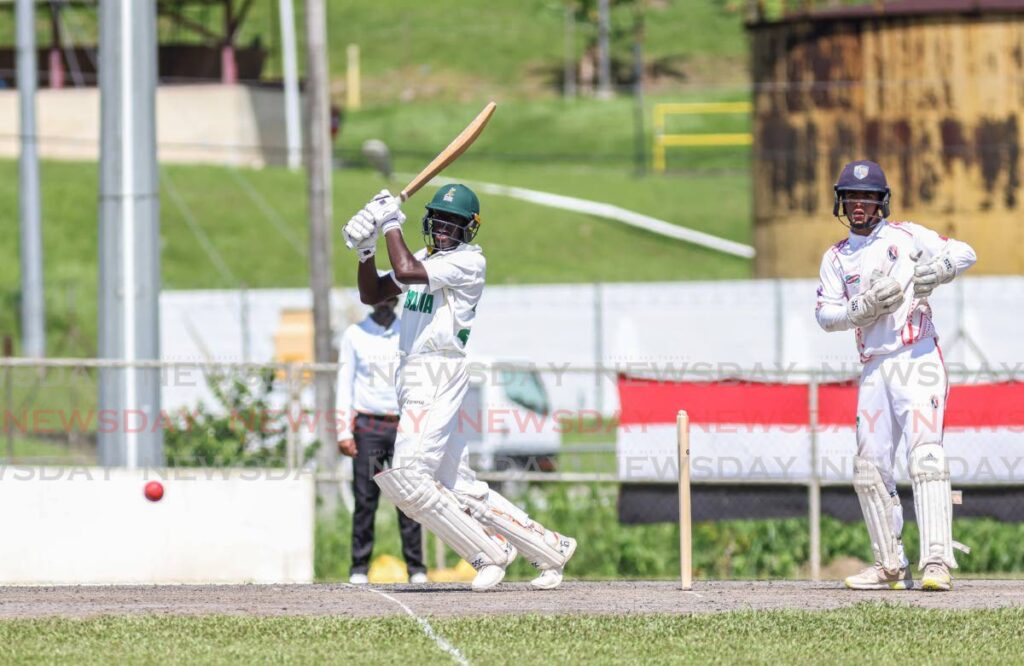 Jamaican batsman David Dewar plays a shot vs Trinidad & Tobago U-17s on Saturday at the Powergen Grounds, Penal. - Jeff K Mayers