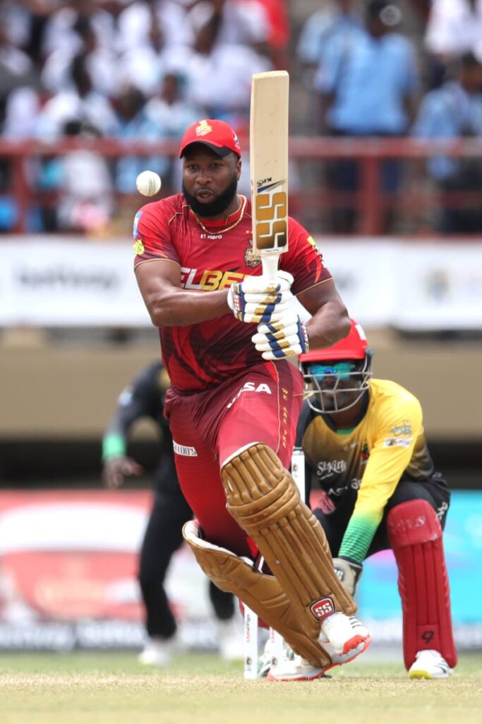 In this September 22, 2022 file photo, Kieron Pollard of Trinbago Knight Riders bats during the 2022  Caribbean Premier League match against St Kitts & Nevis Patriots at Providence Stadium in Georgetown, Guyana. -  CPL T20