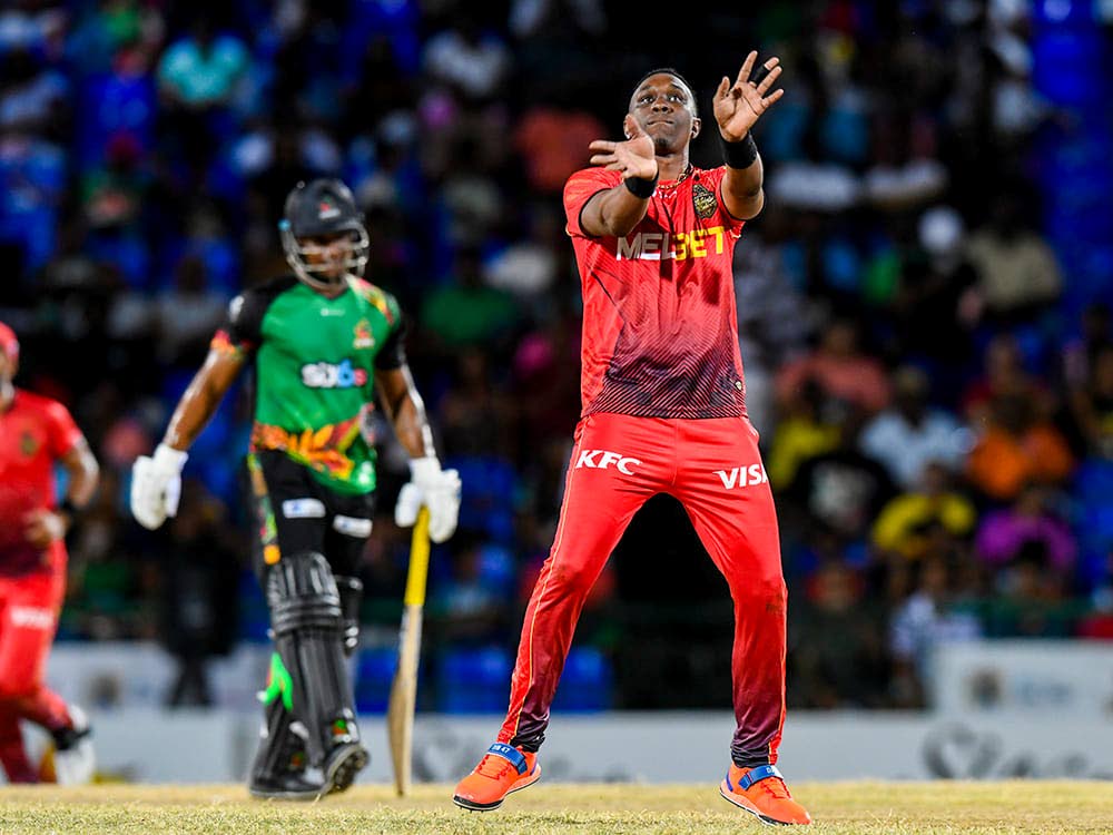 TKR's Dwayne Bravo celebrates a wicket against St Kitts and Nevis Patriots at Warner Park, St Kitts on Sunday. PHOTO COURTESY TRINBAGO KNIGHT RIDERS - 