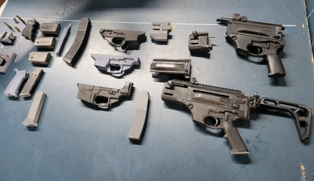 3D-printed gun components found by police at a house in Caparo on Wednesday. One man was arrested in relation to the find. - TTPS