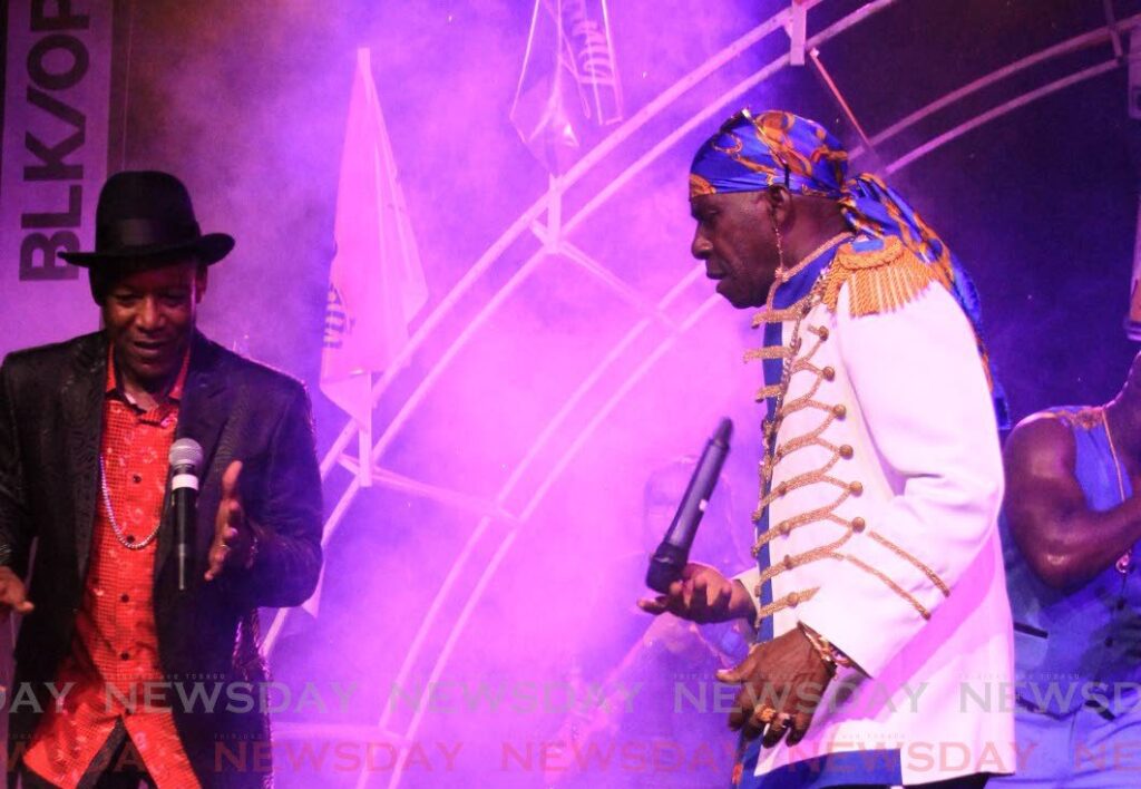 In this file photo, veteran soca singers Ronnie Mc Intosh and Austin 'Super Blue' Lyons, perform at Sound Forge, St James in 2022. - Angelo Marcelle
