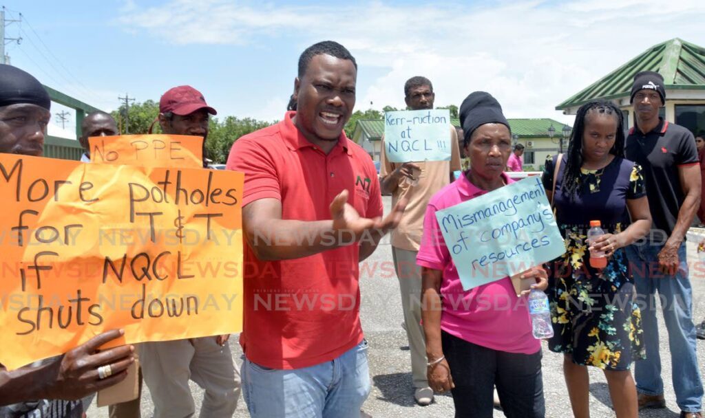 National Quarries Company Ltd workers stage a protest outside the company's head office, Churchill Roosevelt Highway, Piarco on August 2. FILE PHOTO - 