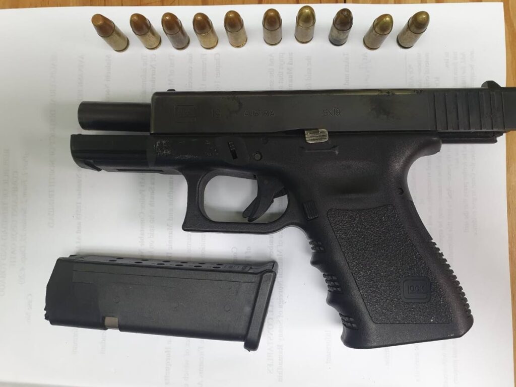 The Glock pistol with ten rounds of ammunition seized by the police in the Northern Division on September 1. - Photo courtesy TTPS