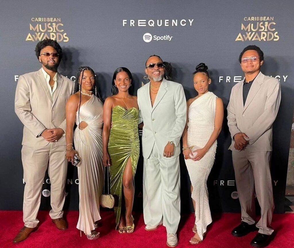 Soca star Machel Montano, third from right, with members of his family at the Caribbean Music Awards, in New York on August 31. Montano was awarded a Lifetime Achievement Award.  - Photo courtesy Caribbean Music Awards