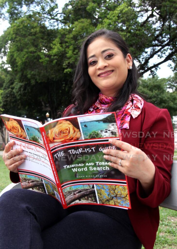 Asha Biroo-Sankar says she hopes that tourists and locals alike will get a chance to “dive into” her new puzzle book The Tourist Guide: Trinidad and Tobago Word Search. - Photo by Ayanna Kinsale