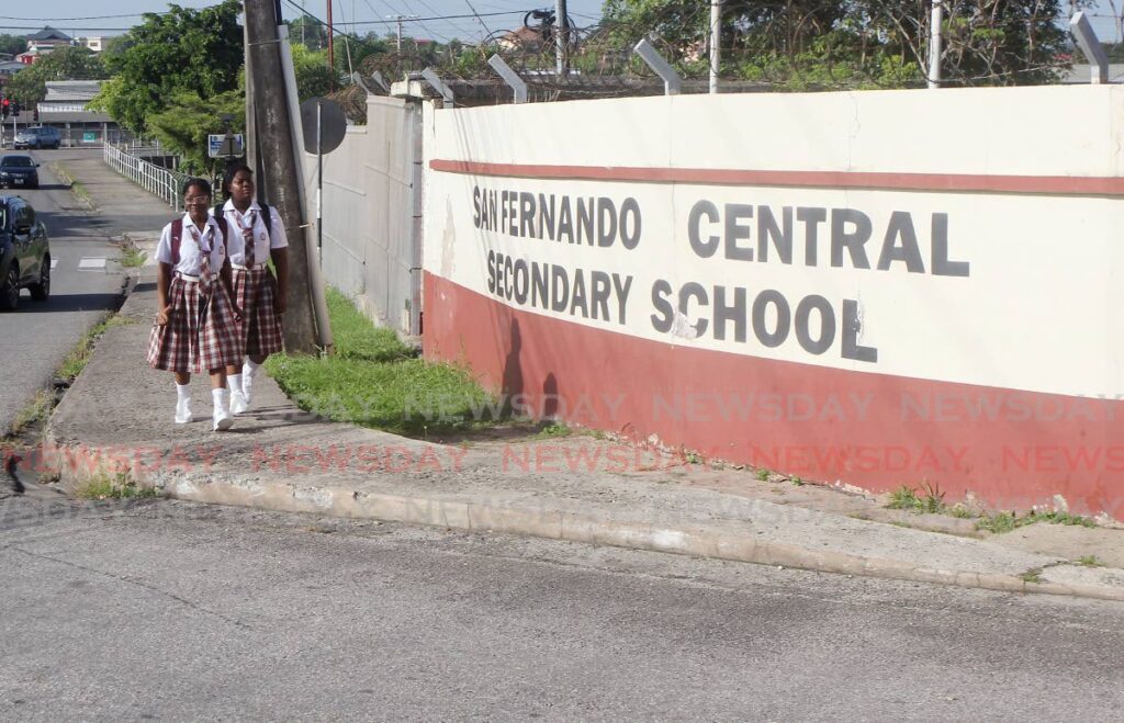 San Fernando Central secondary school students making their way to school at the start of the new school term. - Photo by Lincoln Holder