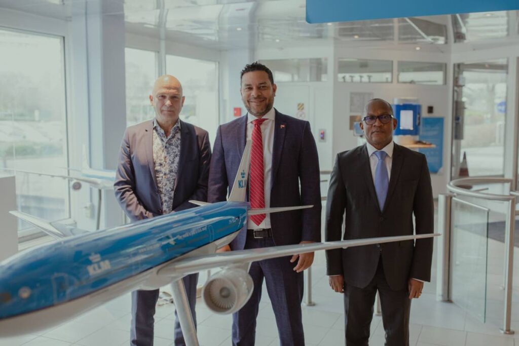 Tourism, Culture and the Arts Minister Randall Mitchell (centre) with KLM's executives at the airline's headquaters in Netherlands.
Photo courtesy Tourism Ministry - 