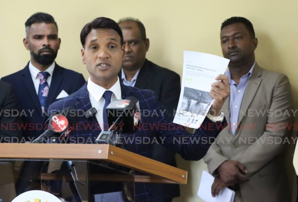 Princess Town MP Barry Padarath speaks to the media about water issues in TT at the UNC's Headquarters in Chaguanas, on Tuesday. - Photo by Angelo Marcelle