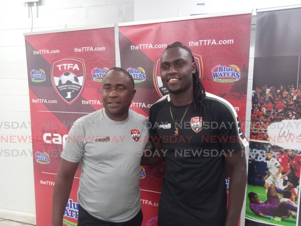 TT men's coach Angus Eve, left, with new captain Aubrey David at the Hasely Crawford Stadium, Mucurapo, Wednesday. - Stephon Nicholas