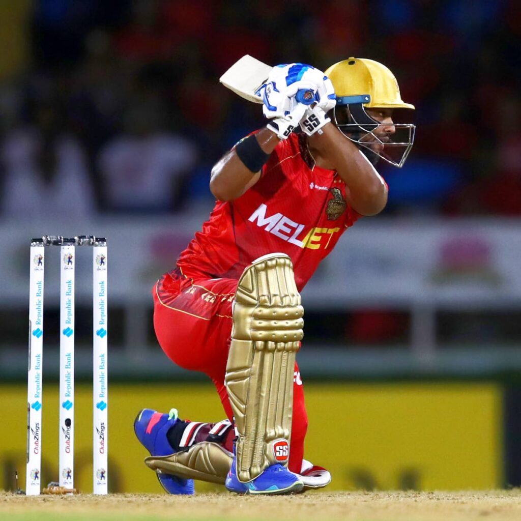 Trinbago Knight Riders' Nicholas Pooran plays a shot during his unbeaten knock of 102 runs against the Barbados Royals, in the Caribbean Premier League T20 match, on Wednesday, at the Queen's Park Oval, St Clair. - via Trinbago Knight Riders