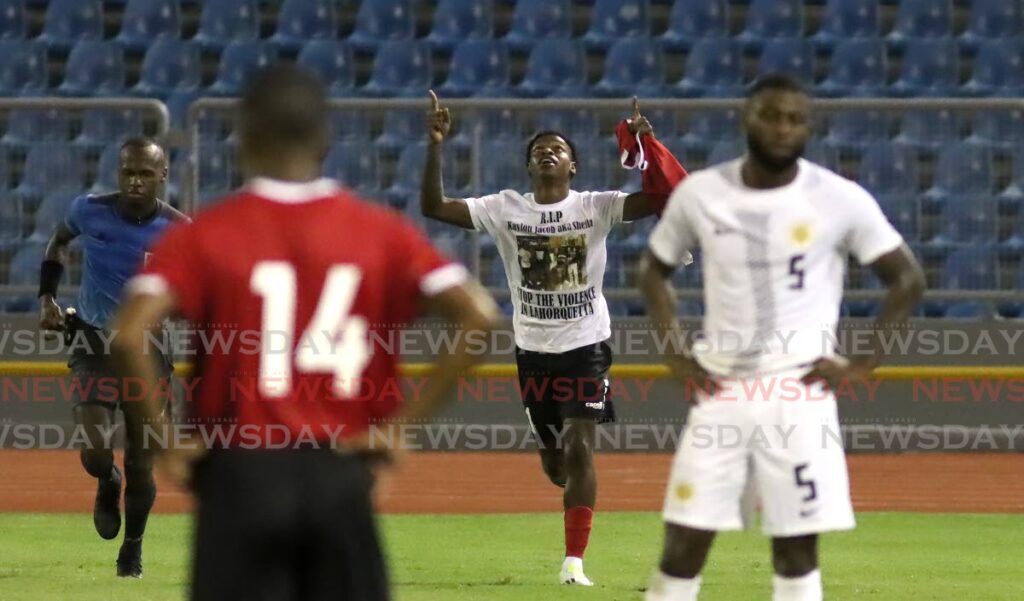 TT forward Nathaniel James looks to the heavens after scoring a goal against Curacao in the Concacaf Nations League at the Hasely Crawford Stadium, Mucurapo, Thursday.  - ROGER JACOB