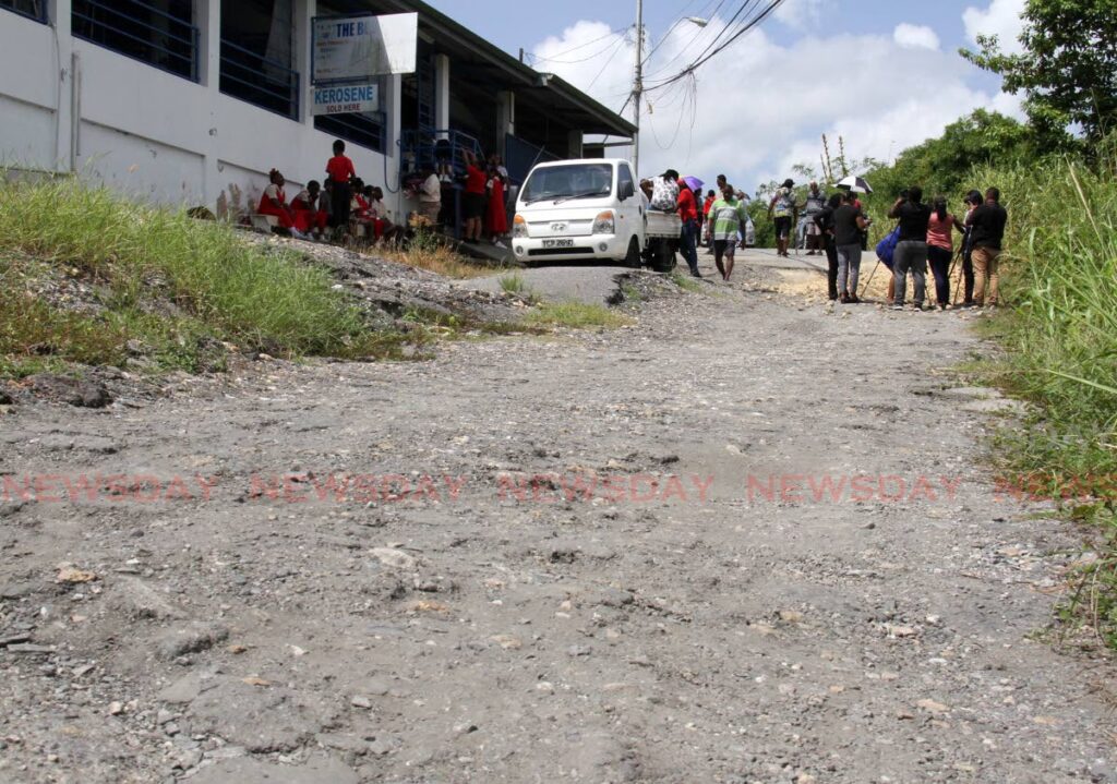 The damaged road leading to Caratal Sacred Heart RC School on Caratal Road, Gasparillo. - AYANNA KINSALE