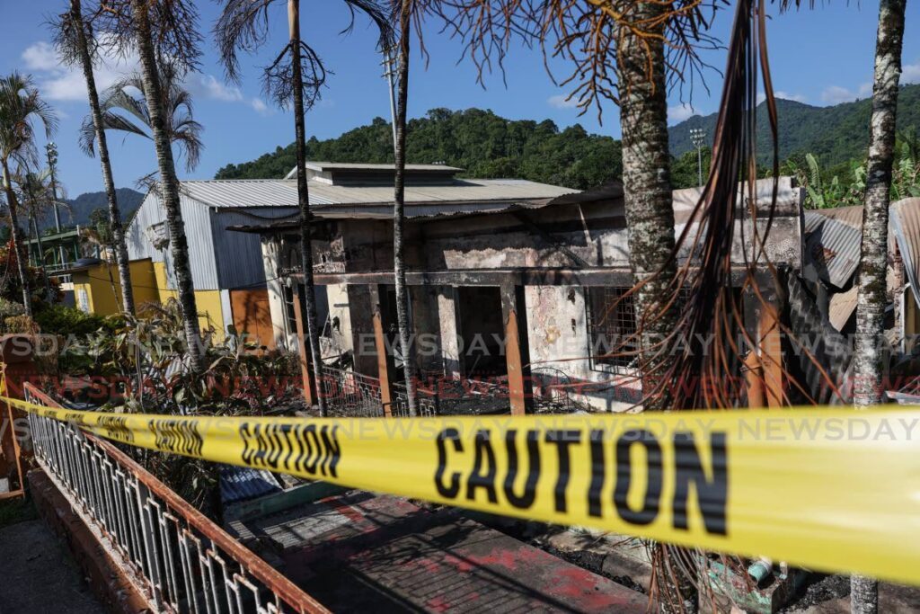 The house where 98-year-old Malcolm Diaz perished by fire on Rosemary Street, Cantaro Village, Santa Cruz on Friday night.  - Jeff K. Mayers