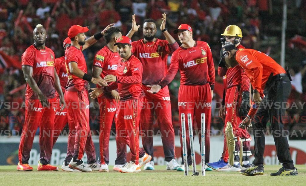 TKR team celebrating a wicket against Jamaica Tallawahs at the Brian Lara Cricket Academy.  - Photo by Lincoln Holder