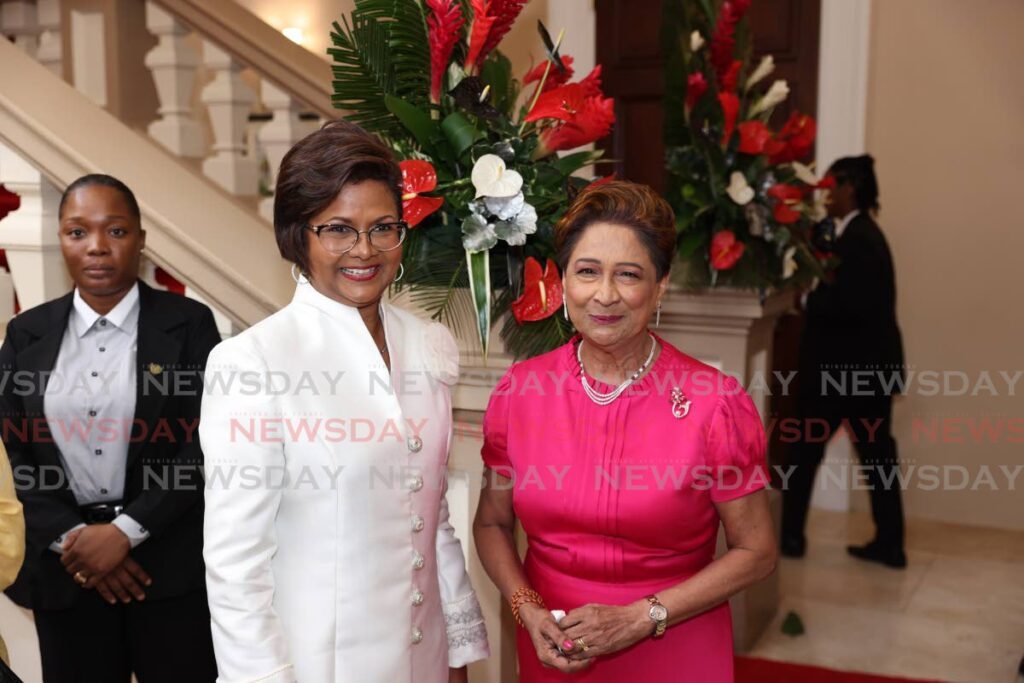 President Christine Kangaloo, left, and Leader of the Opposition Kamla Persad-Bissessar at the Red House Rotunda after the ceremonial opening of the Fourth session of the 12th Parliament, Port of Spain on Monday. - Jeff K. Mayers
