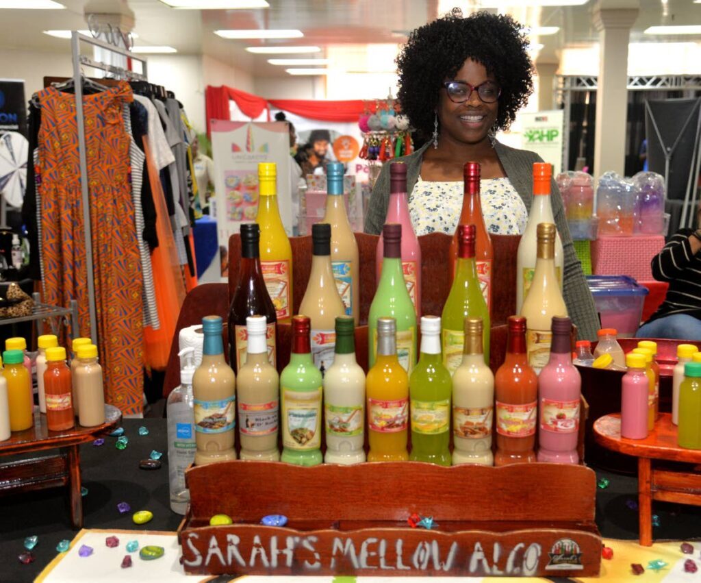 Sarah Callendar of Sarah's Mellow Alco at her booth during NEDCO's entrepreneurship expo. - 