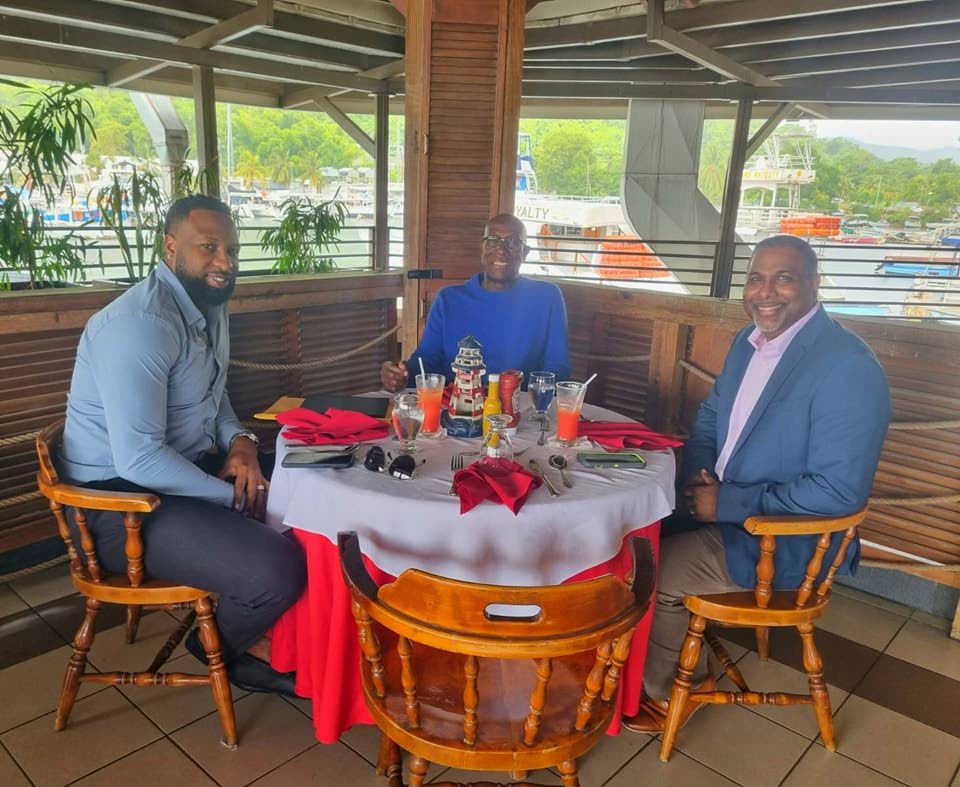 Prime Minister Dr Keith Rowley (C), Trinbago Knight Riders captain Kieron Pollard (L) and former West Indies spinner Dinanath Ramnarine met at the Crews Inn Chaguaramas, on Tuesday, to discuss West Indies cricket. - (Office of the Prime Minister)