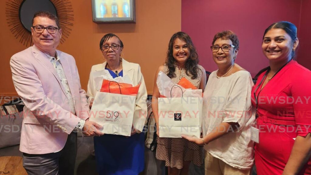 From left, Kiran Singh of the Greater  San Fernando Chamber of Commerce; Jacquelin Rawlins, south regional co-ordinator of ALTA; Chela  Bhimull, board secretary  of ALTA; Suzette Haynes of 519 restaurant; and Denille Babwah, assistant general manager of 519 hounoured membersof ALTA at C3 Mall, San Fernando on Wednesday night. - Yvonne Webb 
