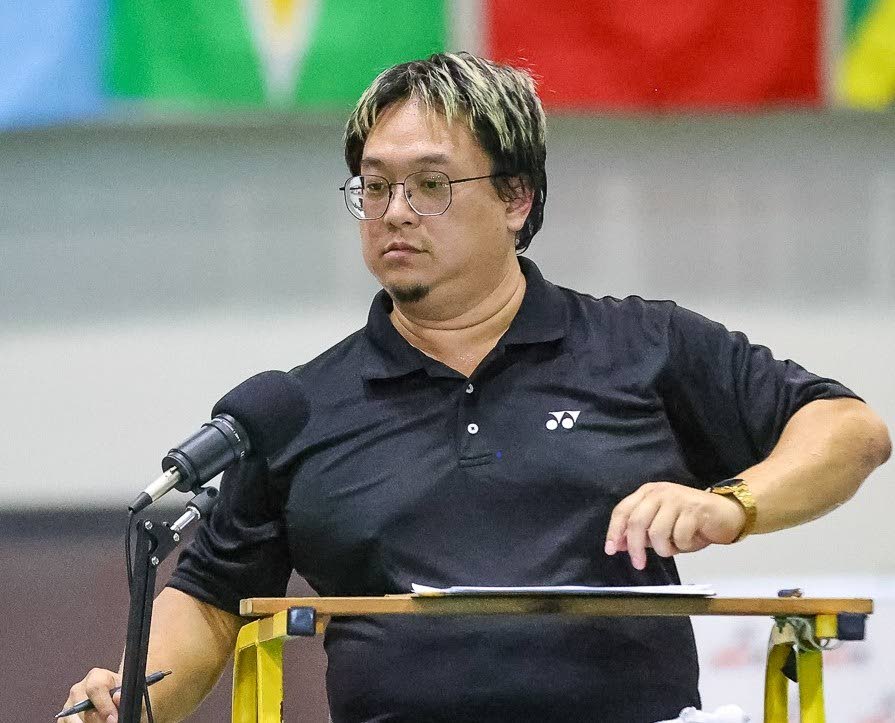 TT badminton official Kevin Yung.