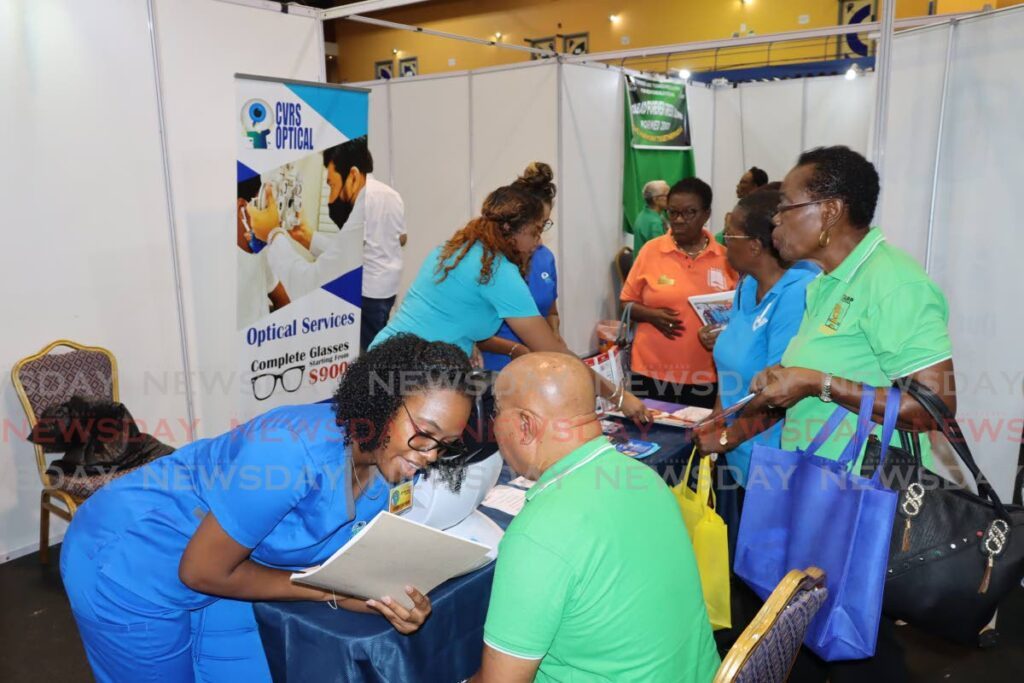 Trinidad Eye Hospital and Cataract, Vitrectomy and Glaucoma Surgeries (CVRS) personnel screen retirees at TTARP's 30th anniversary celebration and expo at the Centre of Excellence, Macoya, last Friday.