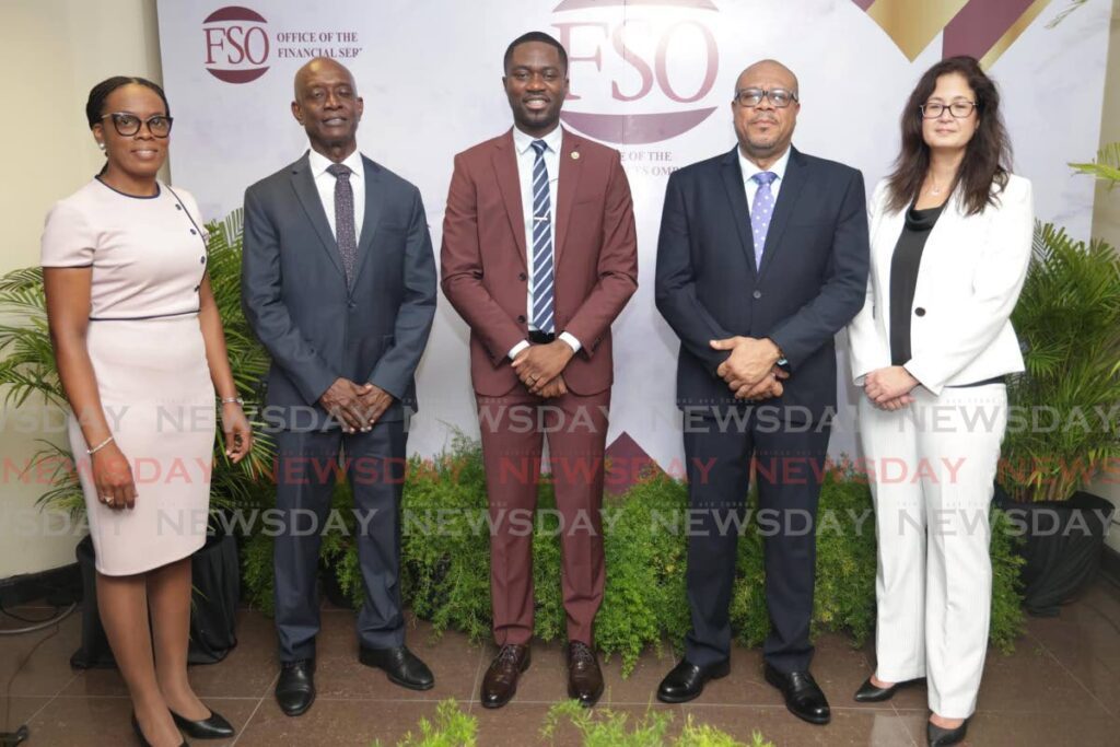 From left, administrator at the Division of Finance, Trade and the Economy, Nikisha Ottley, Governor of Central Bank TT, Alvin Hilaire, Chief Secretary Hon. Farley Augustine, Financial Services Ombudsman, Dominic Stoddard and President of the Bankers Association of TT Gayle Pazos. - Photo courtesy the THA