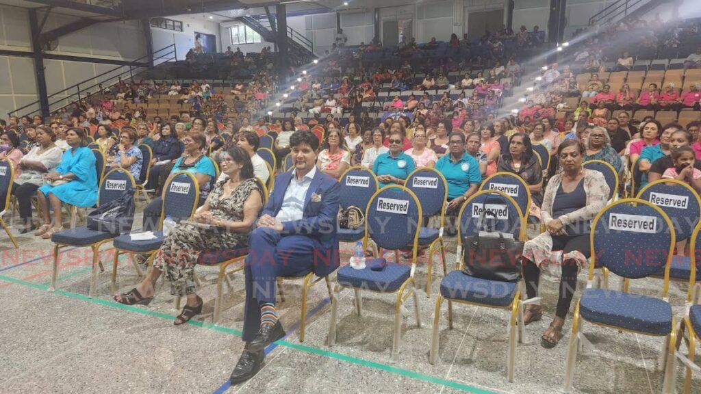 Justice Frank Seepersad, seated in the front row, at the Presbyterian Church's women's rally at Naparima College auditorium, San Fernando on Saturday. - Photo by Yvonne Webb