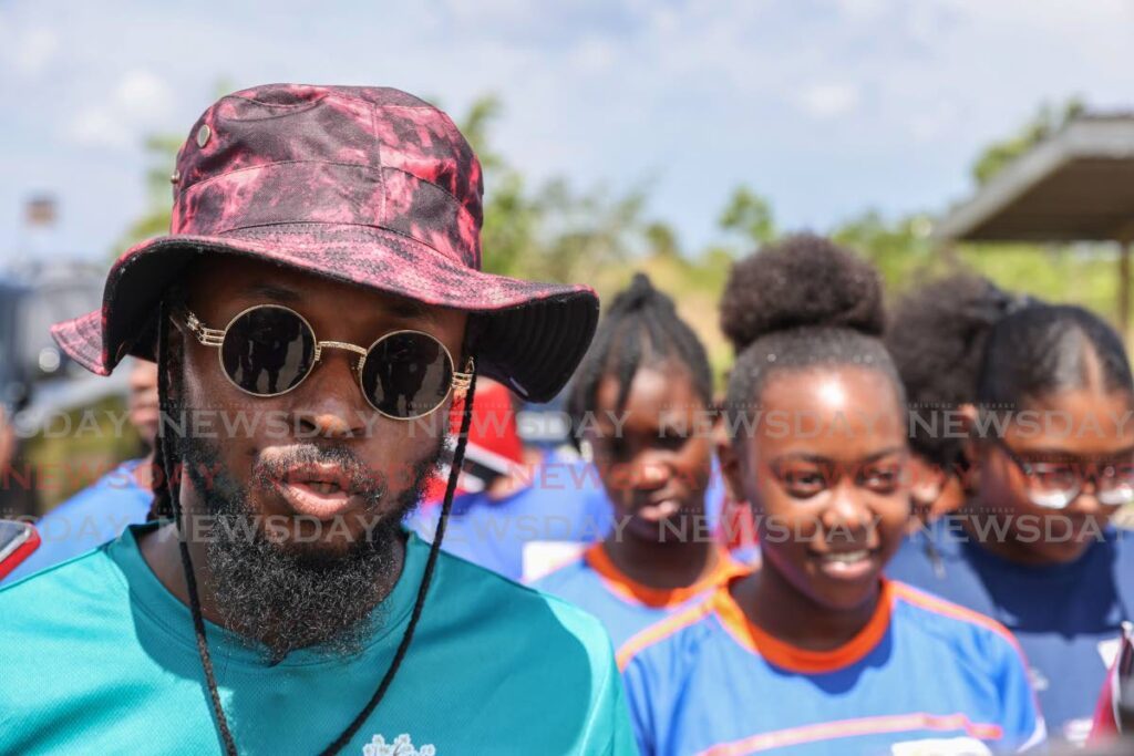 Chairman Sal Tarrae Sustainable Development Foundation Jermel Pierre at the anti-crime march and fun day, Vessigny Secondary School on Saturday.  - Jeff K. Mayers