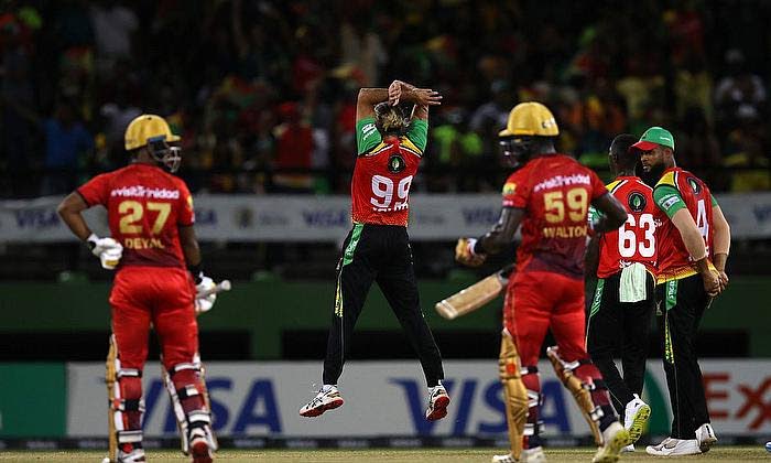Guyana Amazon Warriors captain Imran Tahir (C) celebrates a wicket against the Trinbago Knight Riders, during the final of the Republic Bank Caribbean Premier League T20 tournament, at Providence Stadium, Georgetown, Guyana, on Sunday night. - CPLT20