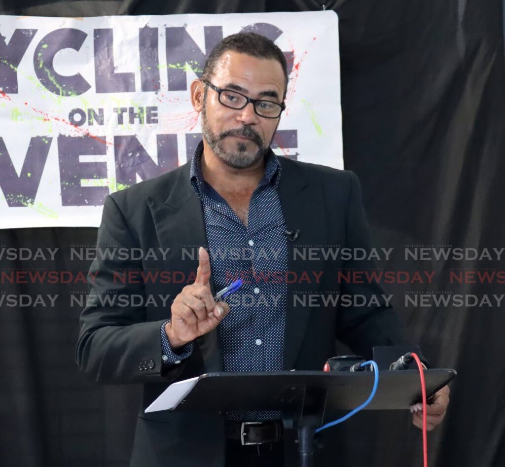 Cycling promoter Michael Phillips speaks during the launch of the 2023 Cycling on the Avenue, held at Mike’s Bikes, Ariapita Avenue, on Thursday. - ROGER JACOB