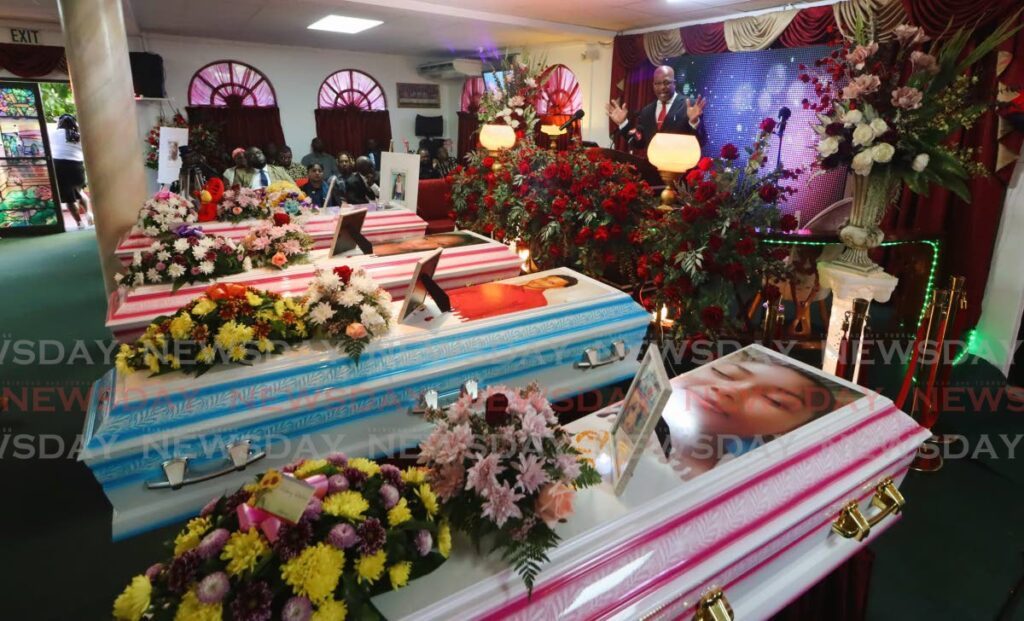 The murdered Peterkin siblings were given a joint funeral service at Allen’s Funeral Chapel in Arima on Friday. The four were killed at their Heights of Guanapo home on September 4. - Roger Jacob