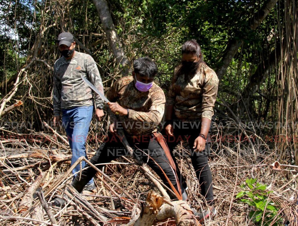 In this file photo, Hunters Search and Rescue team during a search at the Caroni Bird Sanctuary. - AYANNA KINSALE