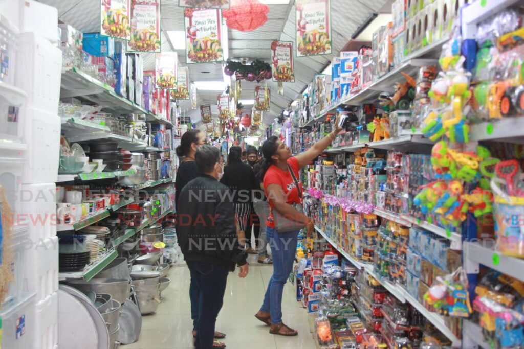 Shoppers in a store in San Fernado last December. Business groups say this year's Christmas shopping will have a chance to return to pre-covid19 pandemic levels. File photo by Marvin Hamilton