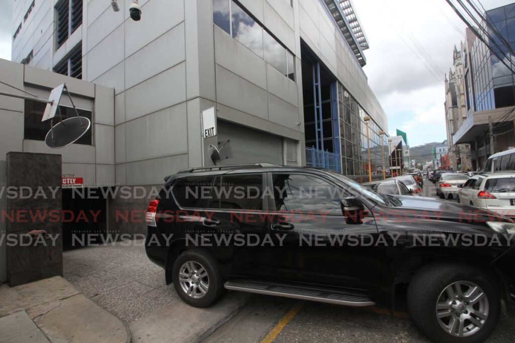 A vehicle leaves the Henry Street exit of the building formerly proposed to house the Office of the Director of Public Prosecutions in Port of Spain. FILE PHOTO/ANGELO MARCELLE  - 