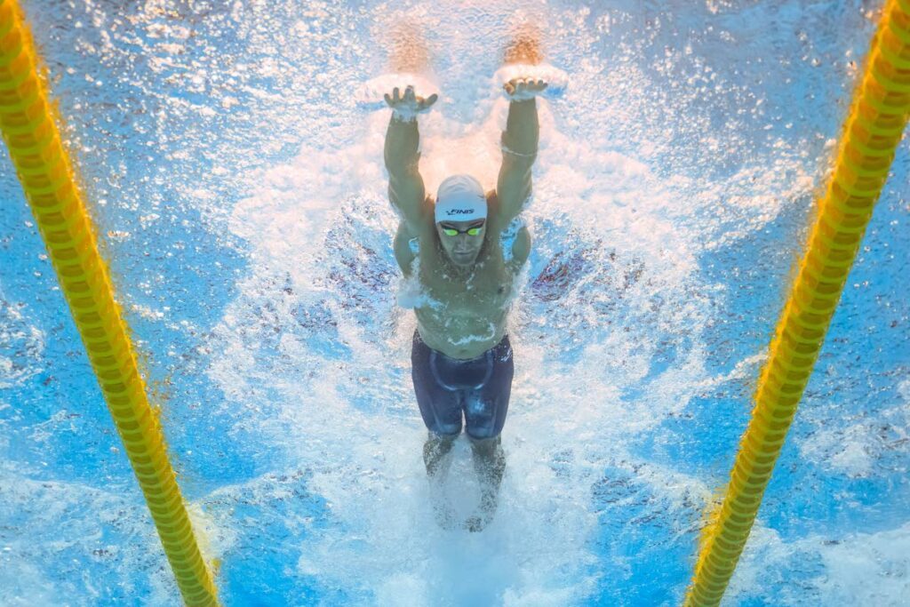 TT's  Dylan Carter competes in a heat of the men's 50m butterfly swimming event during the World Aquatics Championships in Fukuoka, Japan, earlier this year.  - 